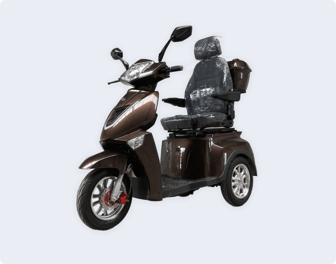 Brown electric mobility scooter with three wheels on a white background. Text on the left promotes sustainable e-mobility, highlighting CO2 savings.